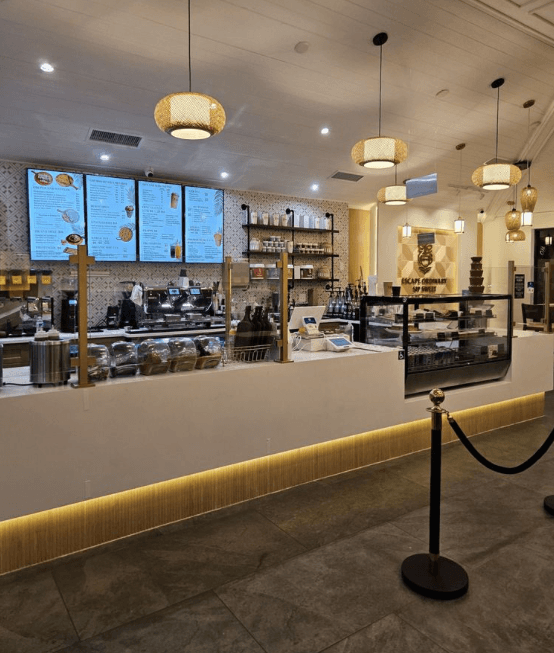 Golden kunafa and specialty coffee under warm café light at Tiki Coffee & Desserts